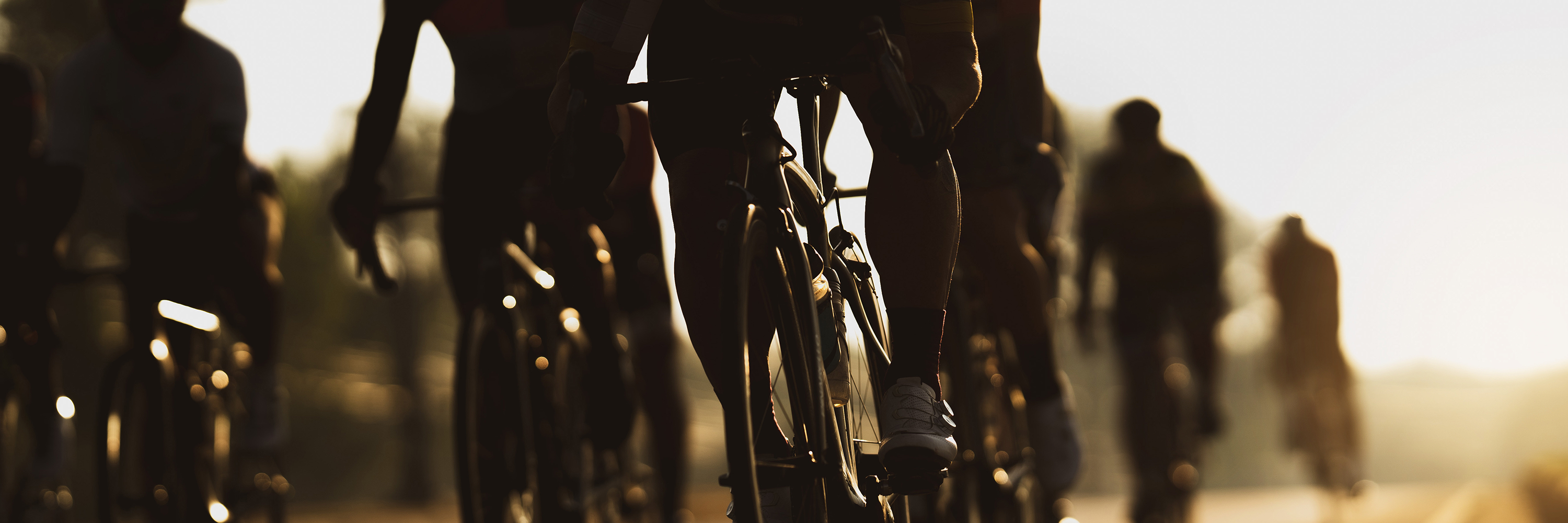 A cycling team riding in the beautiful sunshine